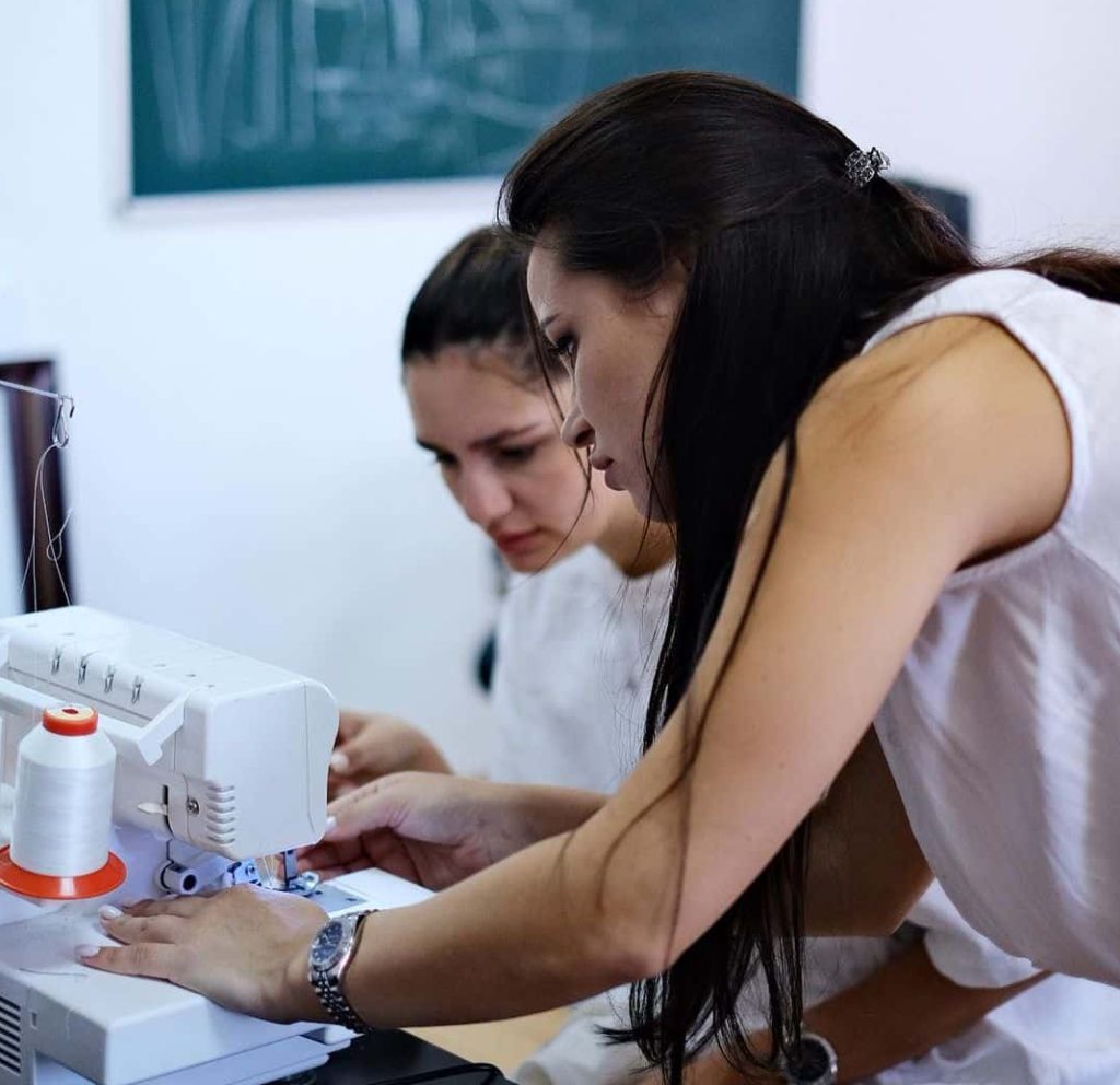 Students at the sewing course